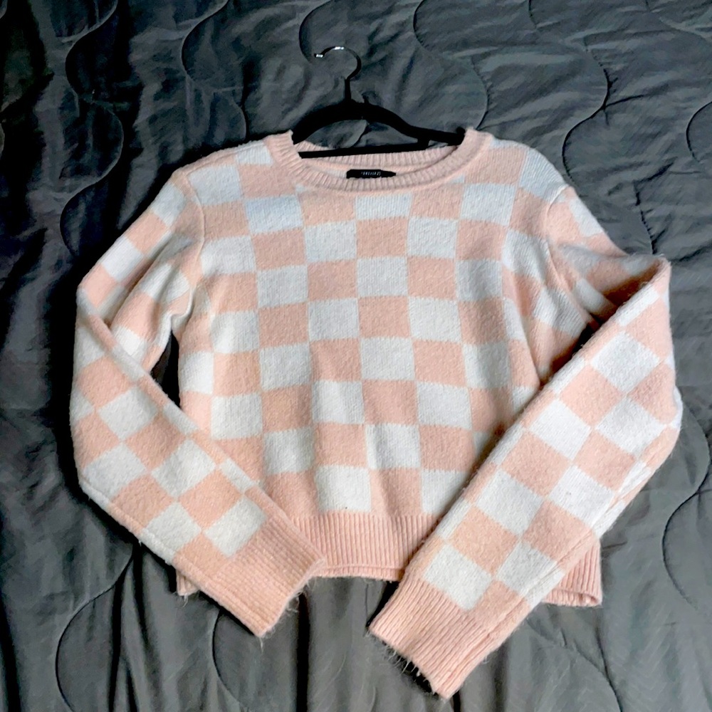 Blush and cream checkerboard pattern sweater